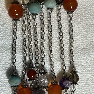 Beautiful bracelet and necklace with silver tone and gem stones,